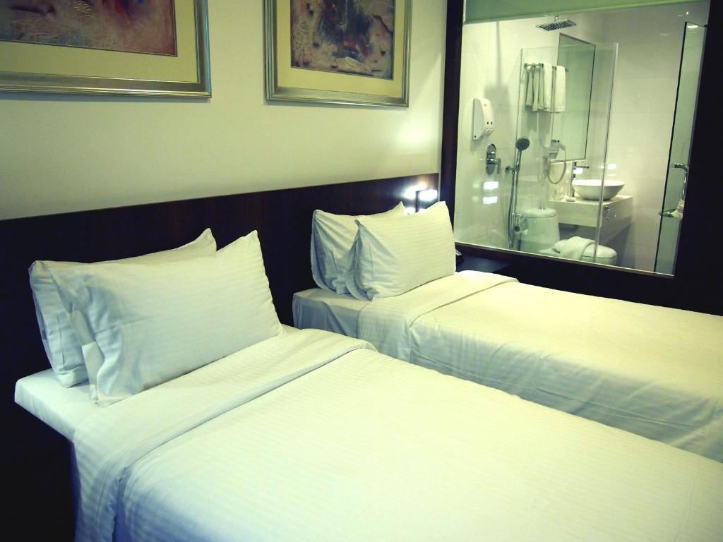 Cove D'Arena Aparthotel Σιγκαπούρη Δωμάτιο φωτογραφία