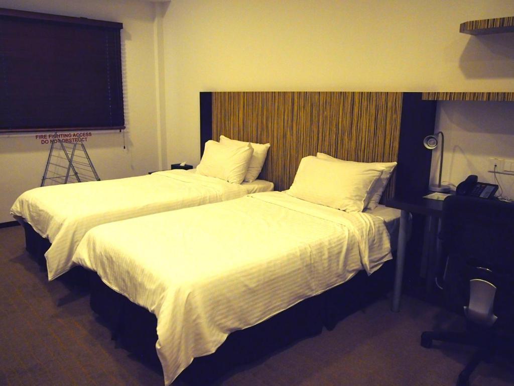 Cove D'Arena Aparthotel Σιγκαπούρη Δωμάτιο φωτογραφία